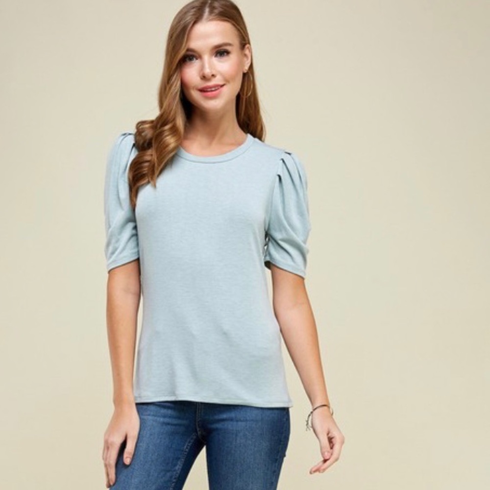 Solid top with detailed sleeves